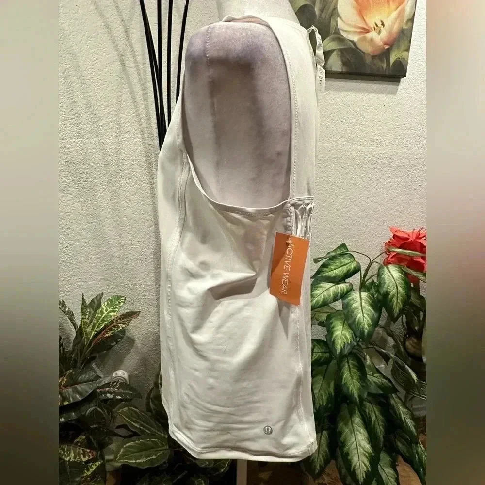 Lululemon Athletica white tank tops size 10